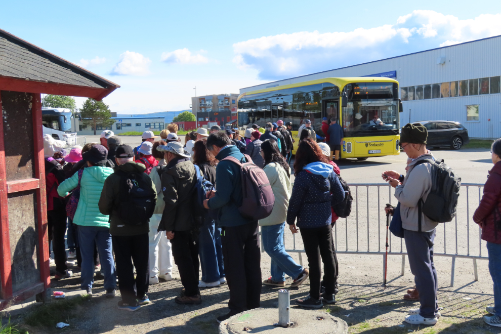 Shuttle busses at the tender dock at Alta, Norway.