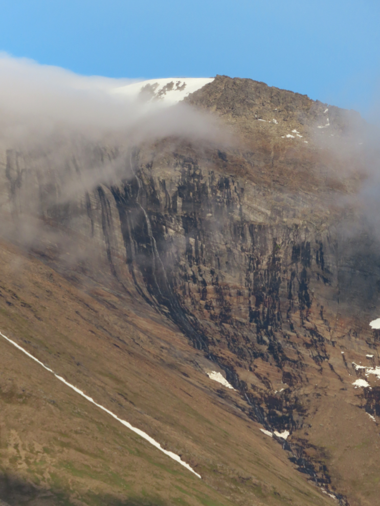 A weeping wall along the coast south of Hammerfest, Norway.