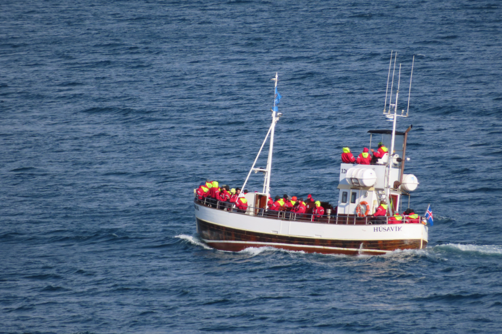 A whale-watching boat returns to Husavik, Iceland.