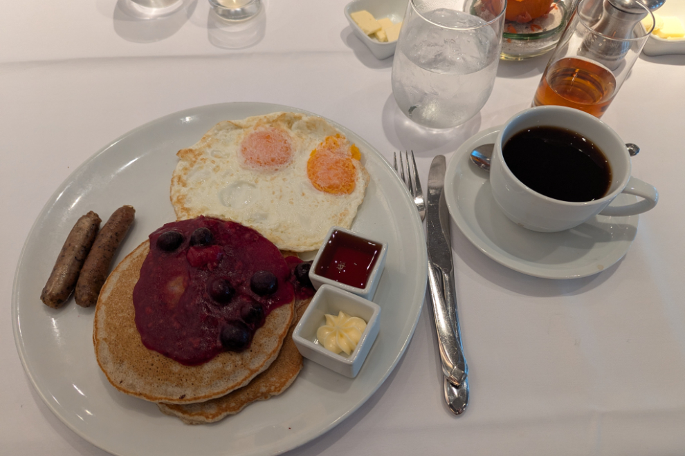 Breakfast in the little Club Orange dining room on the Holland America cruise ship Nieuw Statendam - buckwheat pancakes and eggs.