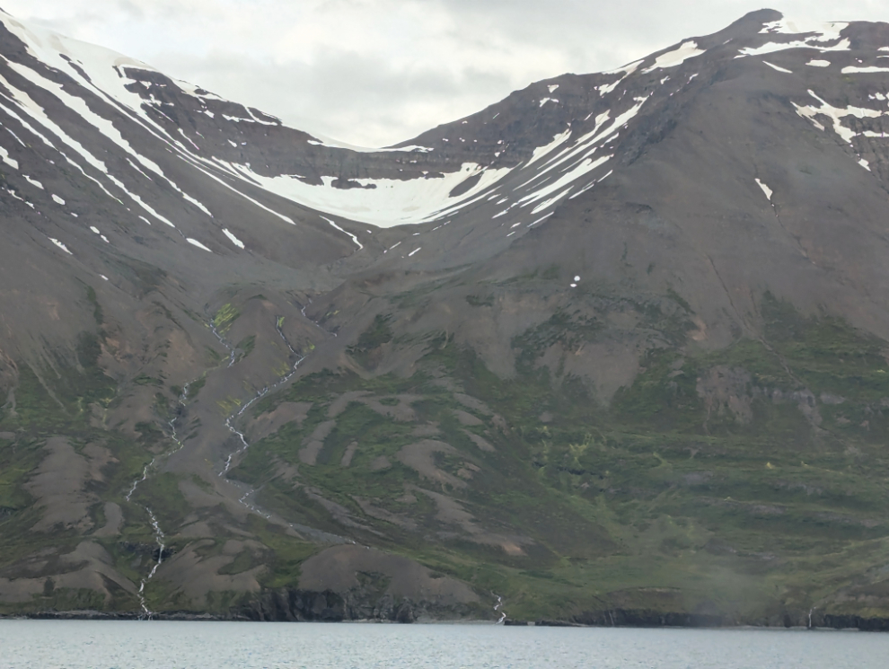Sailing along the dramatic north coast of Iceland.