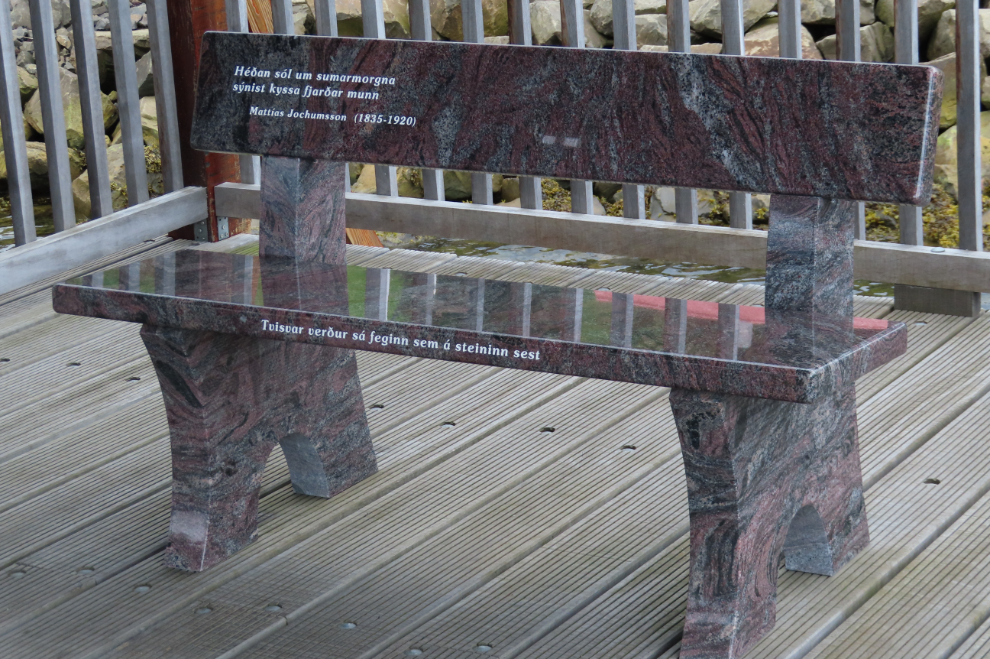 A memorial bench along the waterfront walkaway in Akureyri, Iceland.