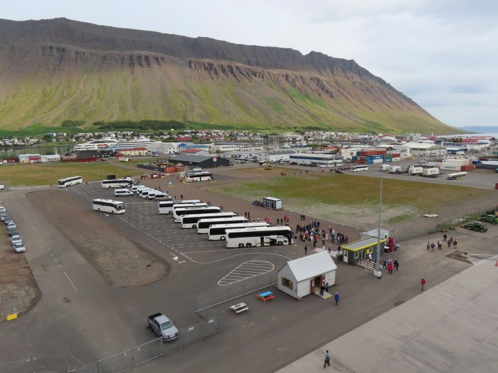 Tour busses and vans at the main cruise ship dock at Isafjordur, Iceland.