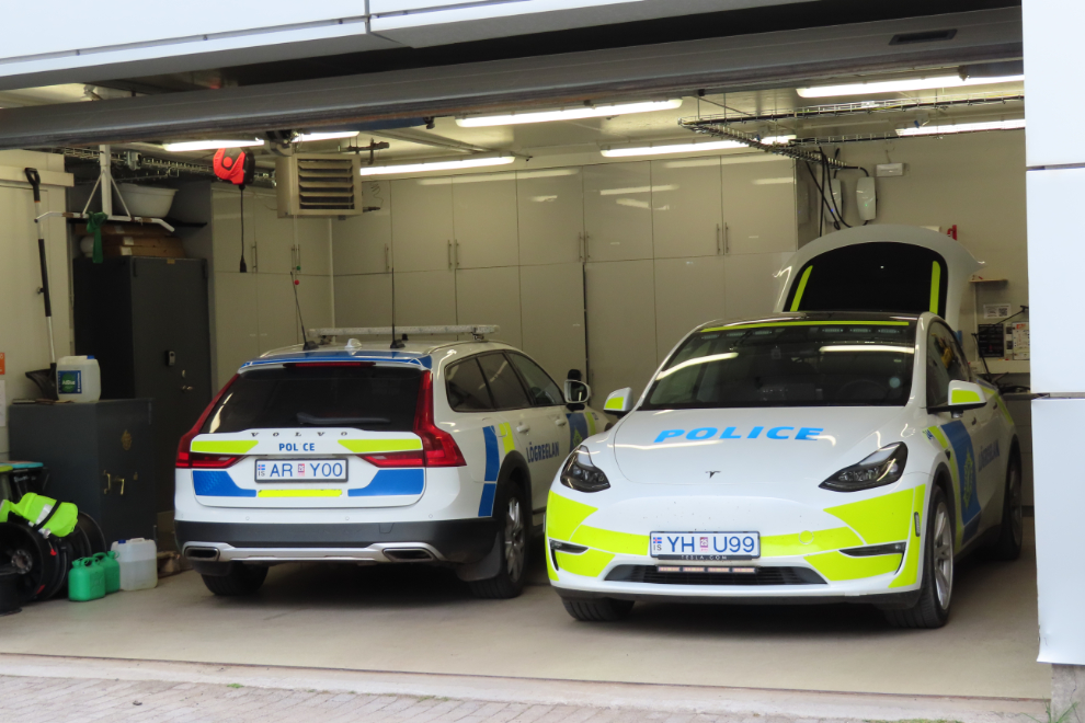 Police cars at Isafjordur, Iceland - a Volvo and a Tesla.