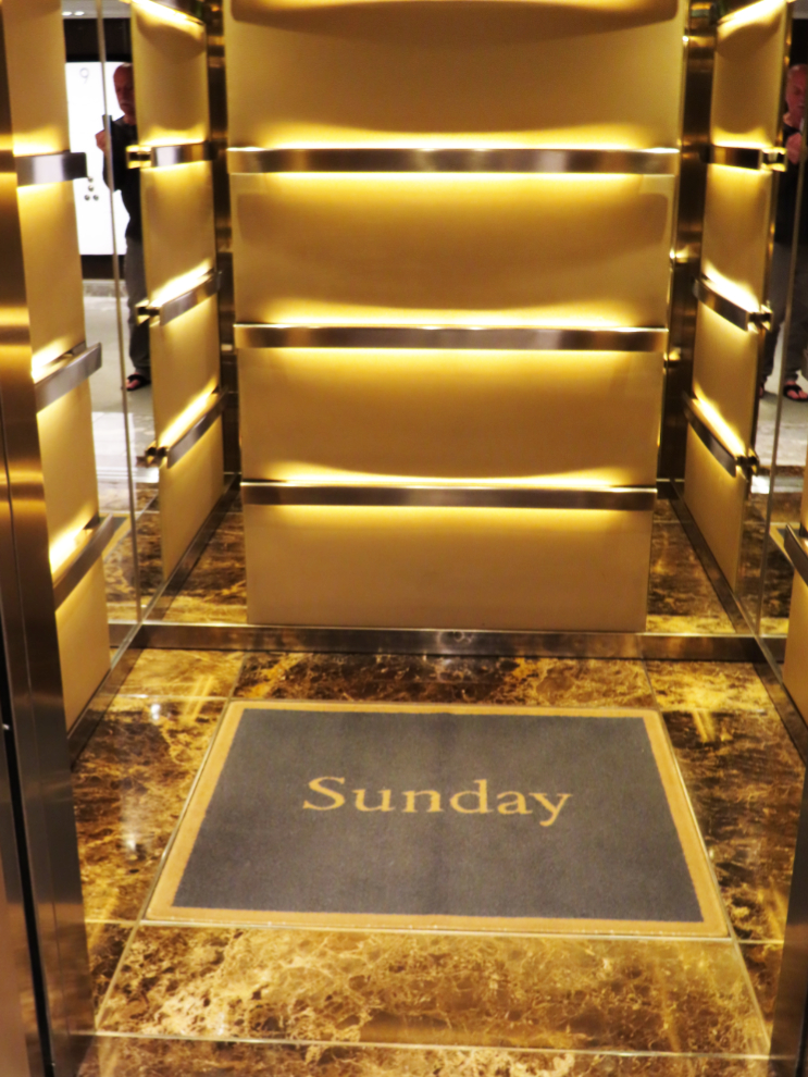 Carpets in each elevator tell us what day of the week it is on the Holland America cruise ship Nieuw Statendam.