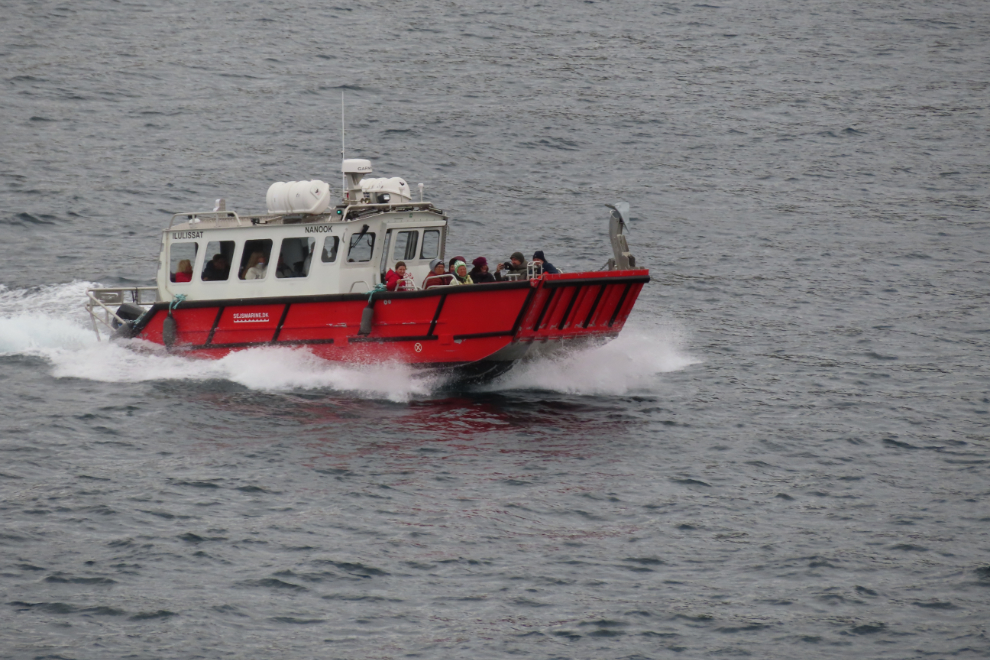 A whale-watching boat heads out at Qaqortoq, Greenland.