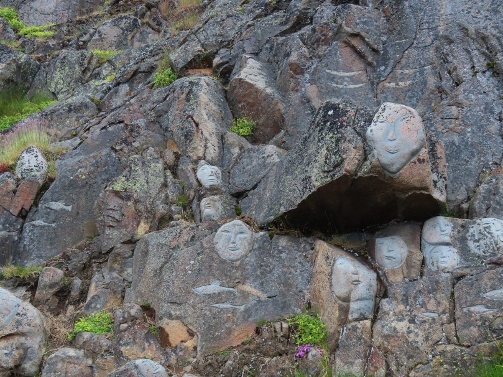 Faces on a granite wall at Qaqortoq, Greenland.