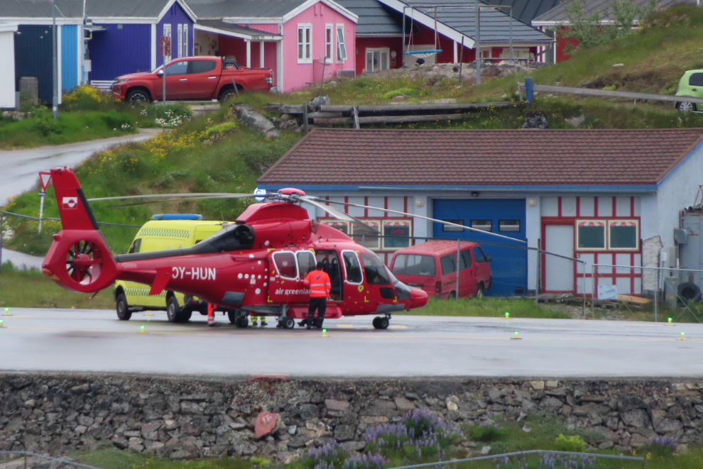 From my verandah on the ship, I watched a medevac in progress. OY-HUN is a Eurocopter EC 155B1 Dauphin operated by Air Greenland.