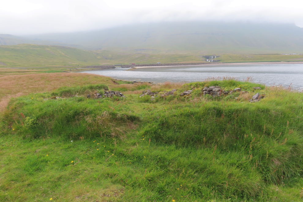 An old stone and earth building foundation near Grundarfjordur, Iceland.