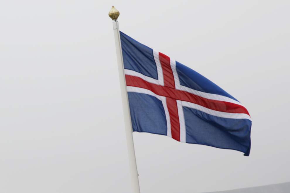 An Icelandic flag flying at Grundarfjordur, Iceland.