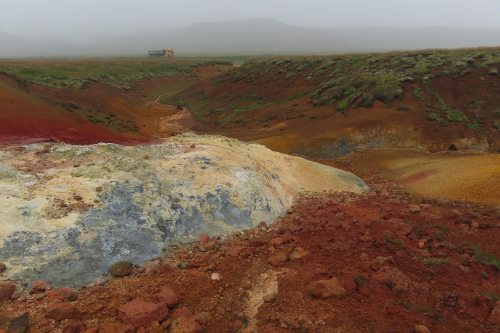 Brilliant colours at the Seltun Geothermal Area on the Reykjanes Peninsula, Iceland, in heavy volcanic smoke.