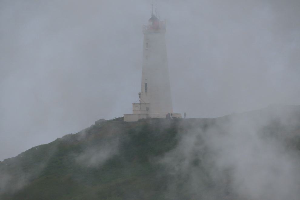 The Reykjanes Lighthouse could occasionally be seen through  steam and heavy volcanic smoke at Gunnuhver Hot Springs, Iceland.
