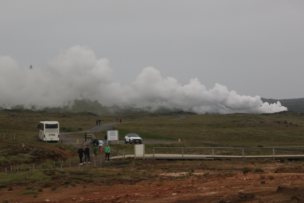 Gunnuhver Hot Springs, Iceland, with steam and heavy volcanic smoke.
