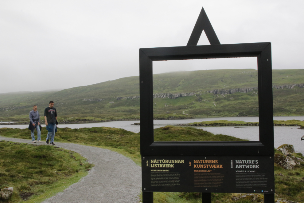 A picture-frame information panel along the main walking path around the lake Toftavatn at Runavik, Faroe Islands.