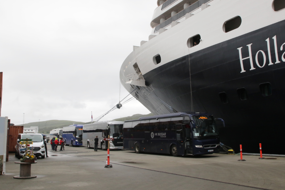 Tour busses at the Holland America cruise ship Nieuw Statendam at Runavik, Faroe Islands.