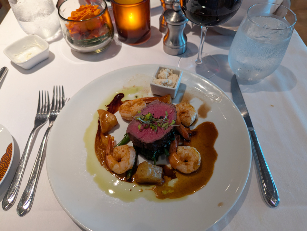 A steak-and-shrimp dinner inn the tiny Club Orange dining room on the Holland America cruise ship Nieuw Statendam.