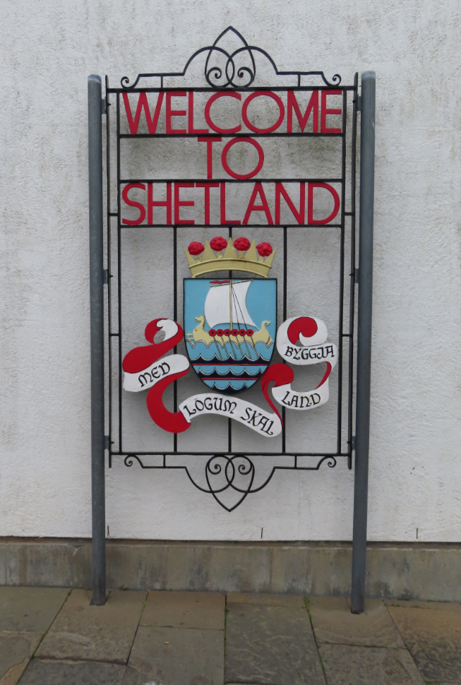 Welcome to Shetland sign at the Lerwick dock.