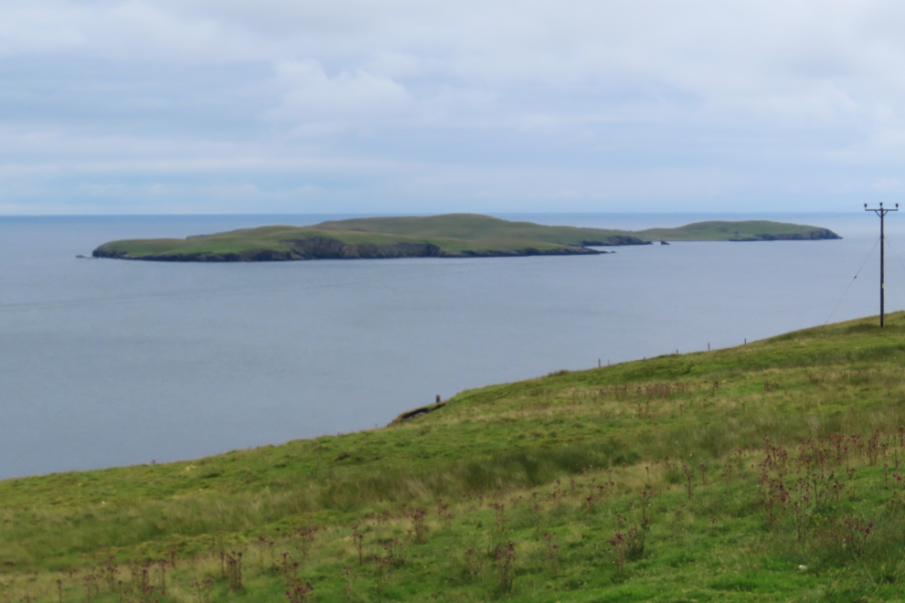A distant view of the island of Mousa, Shetland. 
