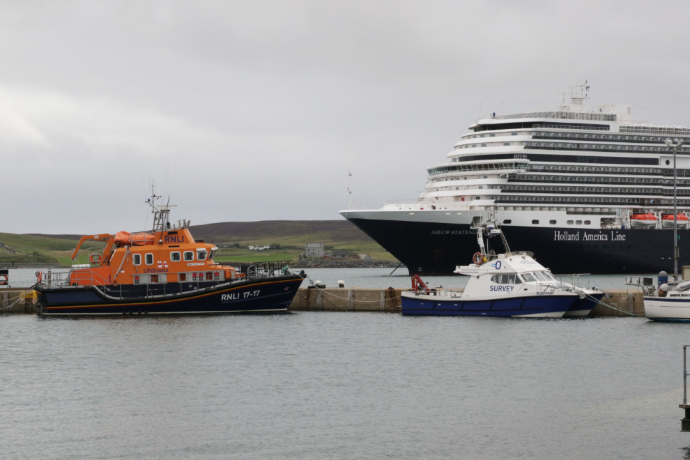 A lifeboat and the Holland America cruise ship Nieuw Statendam at Lerwick, Shetland.