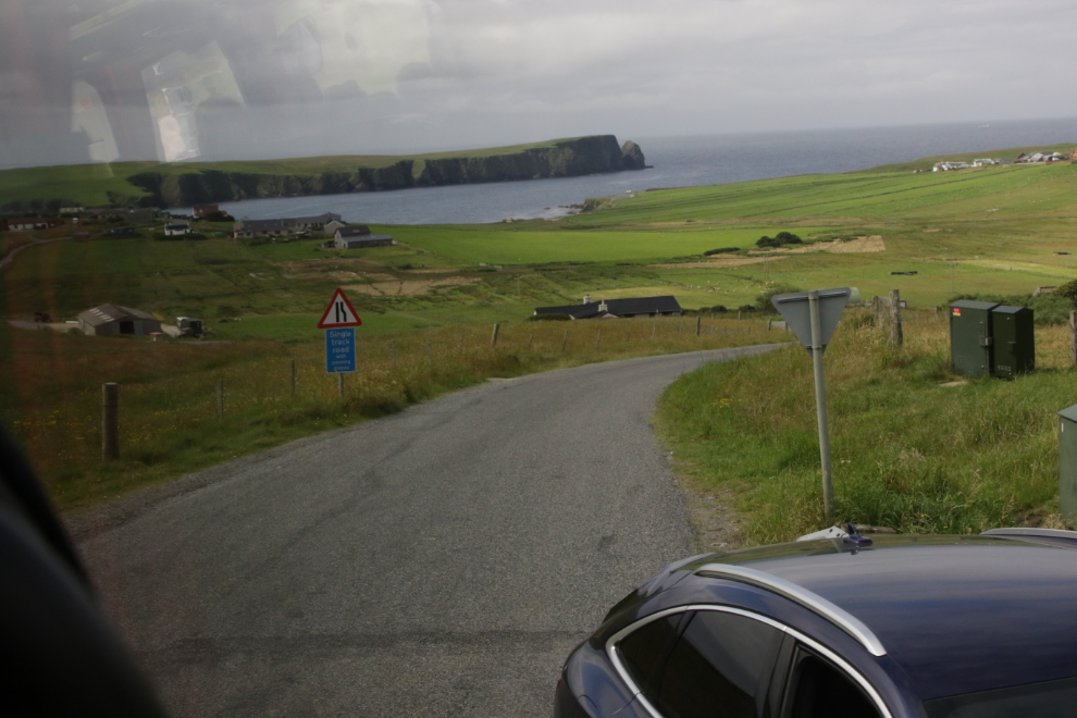Turning towards St. Ninian Isle on a one-lane road in Shetland.