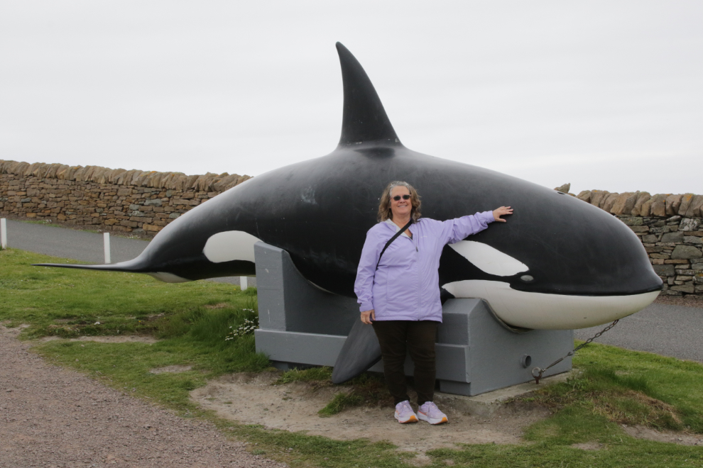 My wife with an orca sculpture at Sumburgh Head Lighthouse, Shetland.