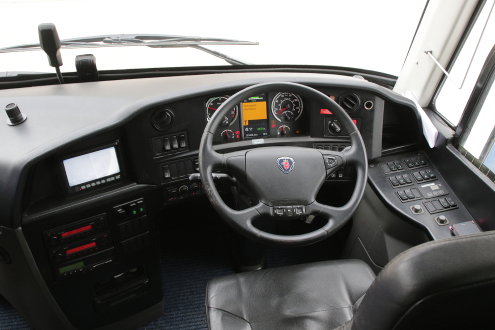 The driver's position of our fairly new Scania coach in Shetland.