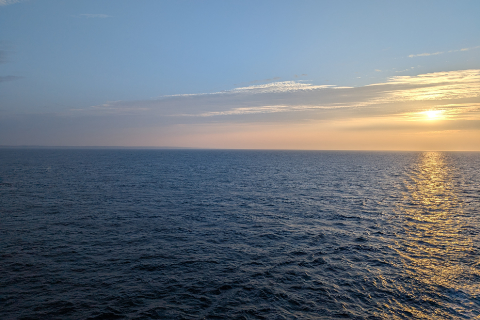 Our last sunset at sea, seen from the verandah of our cabin on the cruise ship Nieuw Statendam.
