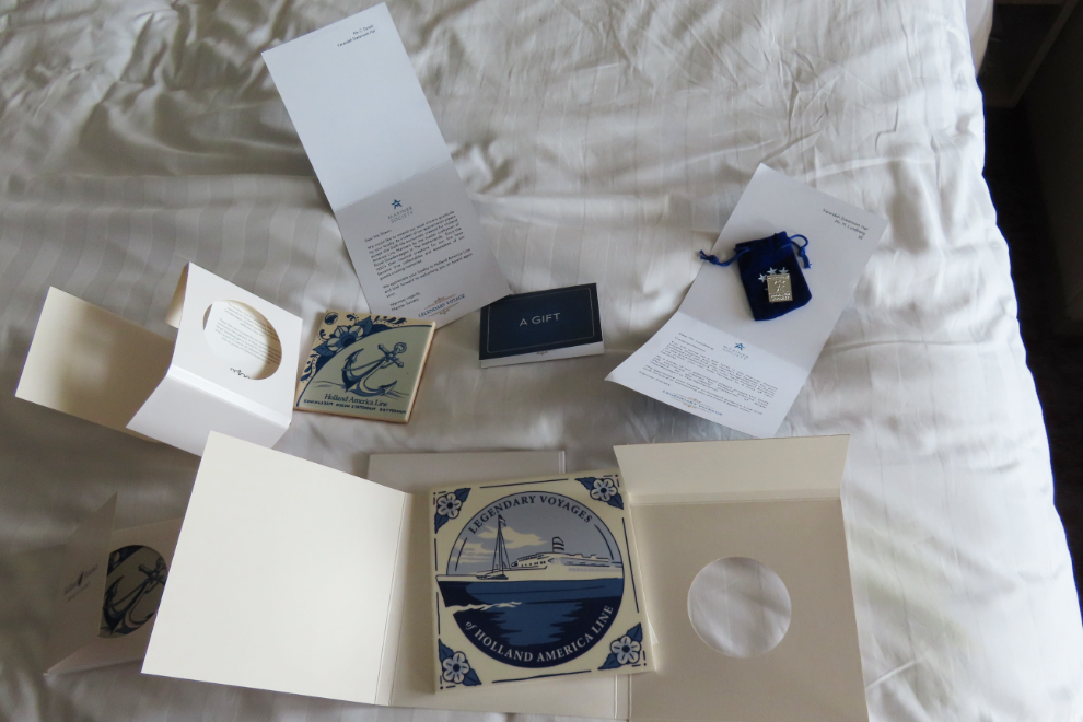 Holland America bling on the bed in our cabin on the cruise ship Nieuw Statendam.