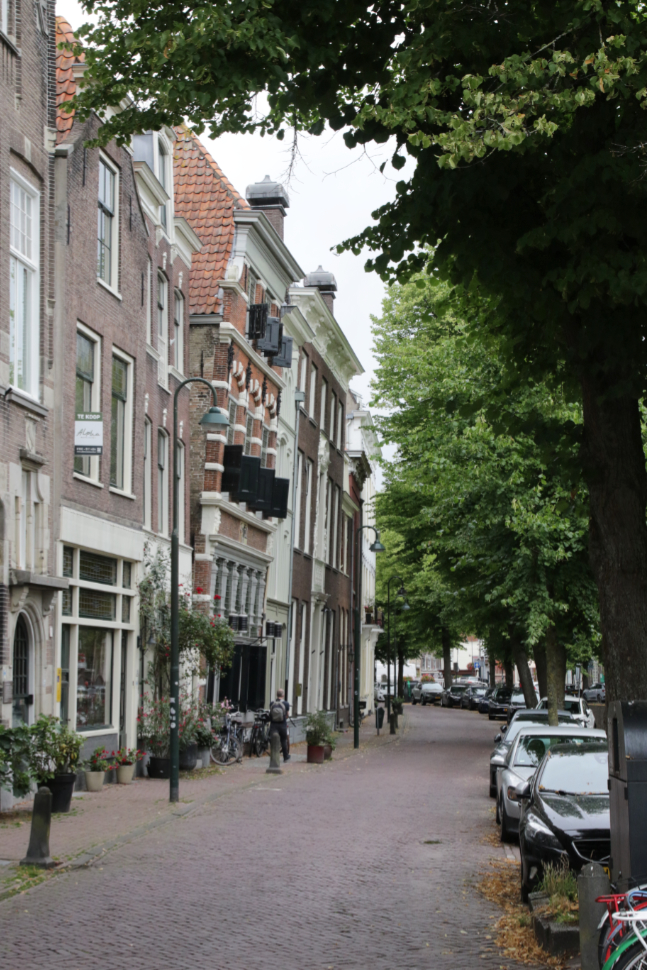 An old building leaning over the street in Amsterdam.