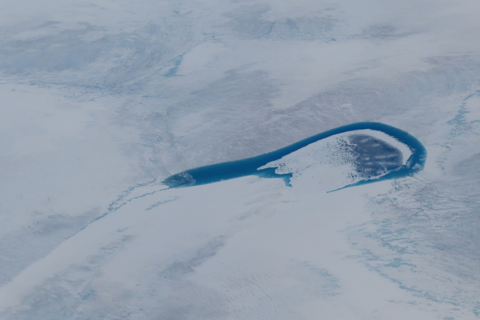 A supraglacial lake on the Greenland ice cap, from 36,000 feet.