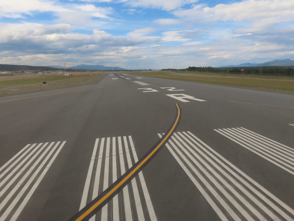 Looking down Runway 32R at Erik Nielsen Whitehorse International Airport, Yukon.