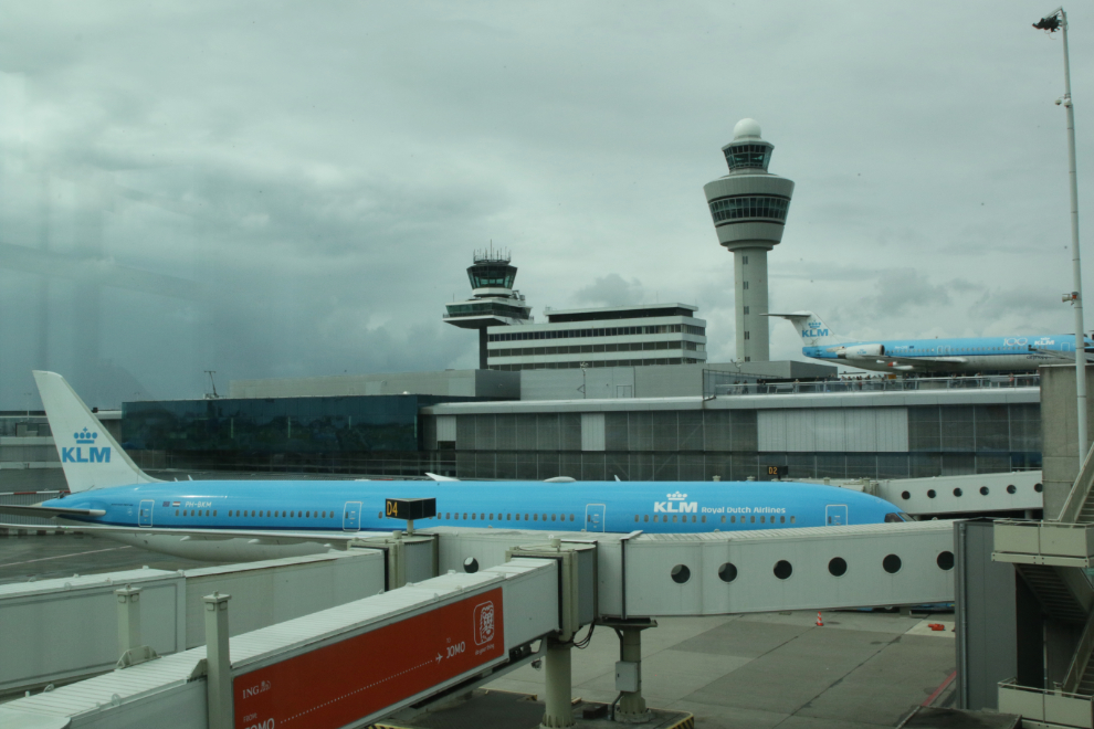 Control towers and KLM aircraft at Amsterdam Airport Schiphol (AMS).
