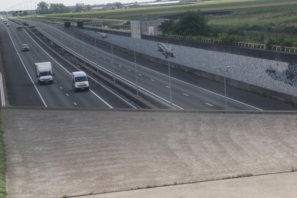 Taxiing over a freeway in an Icelandair Boeing 767 at Amsterdam Airport Schiphol (AMS).