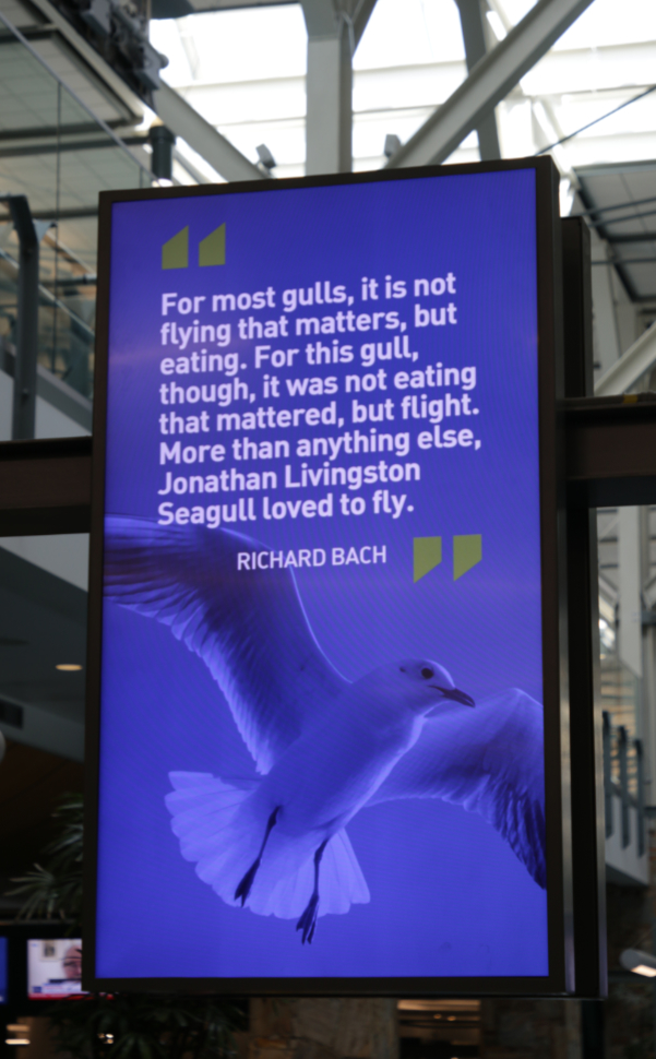 Jonathon Livingston Seagull quote at the luggage carousels at Vancouver International Airport (YVR).