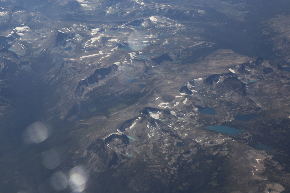An aerial view of mountains on a flight from Vancouver to Whitehorse.