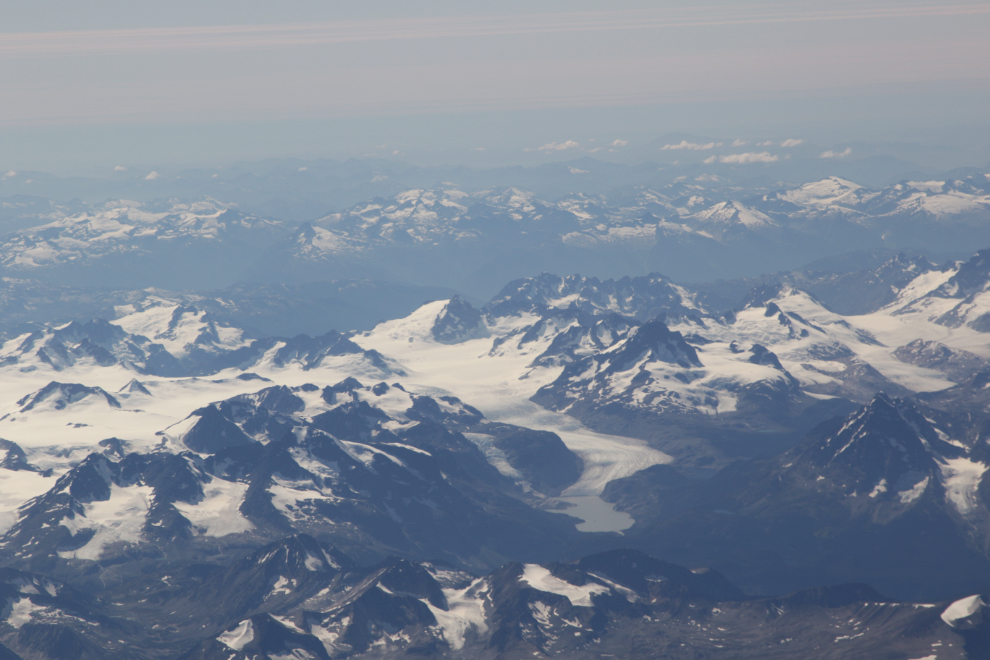 An aerial view of mountains and glaciers on a flight from Vancouver to Whitehorse.