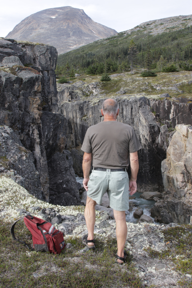 KUHL Resistor Lite Chino hiking shorts above Summit Creek in the White Pass.