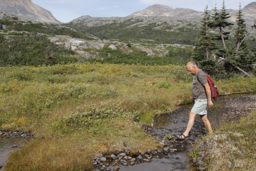 Hiking up Summit Creek on the South Klondike Highway - crossing a little creek.