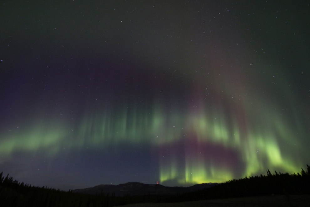 Watching the Northern Lights from the Copper Belt at Whitehorse, Yukon.