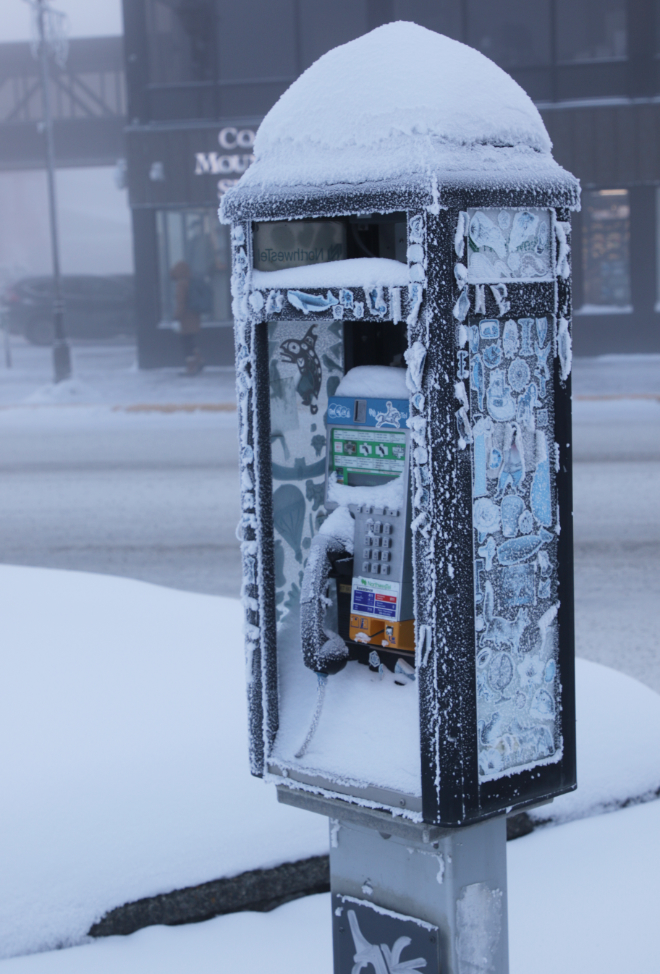 A pay phone in downtown Whitehorse, Yukon, with the temperature at 41 degrees below zero.