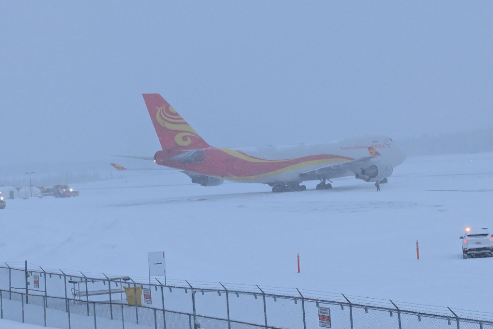 A Boeing 747-4HAF(ER) freighter, registration B-3140, operated by Suparna Airlines, at Whitehorse on a nasty winter day.