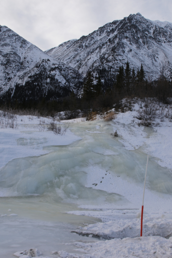Creek glacier beside the Alaska Highway at Kluane Lake in February
