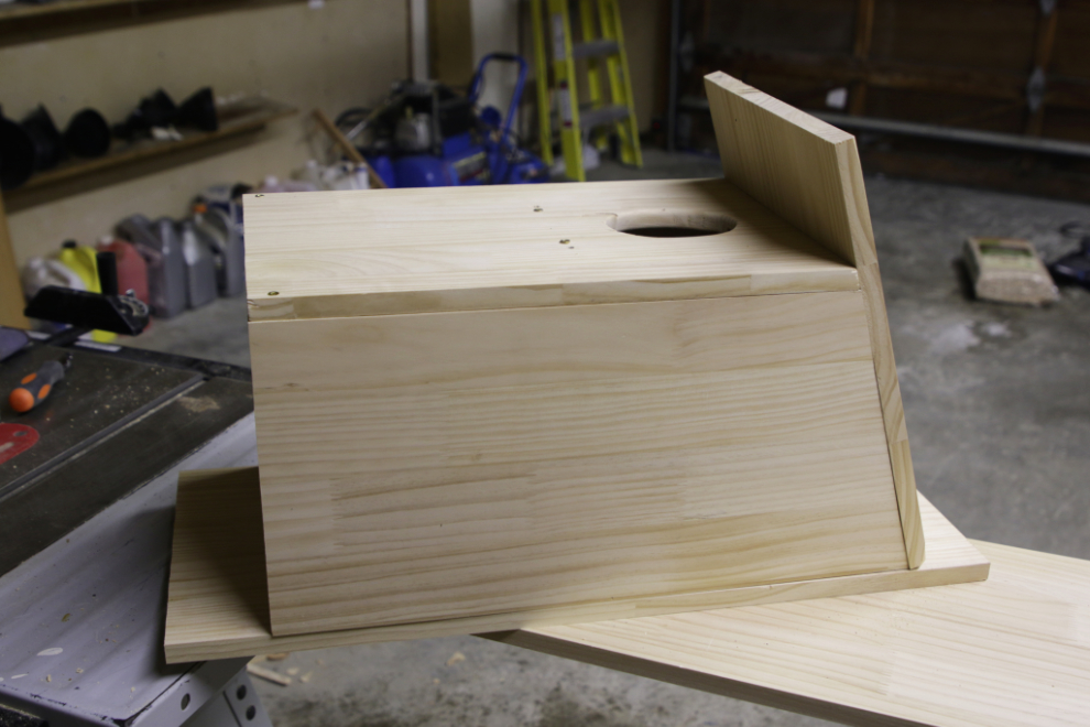 Building a boreal owl nesting box.