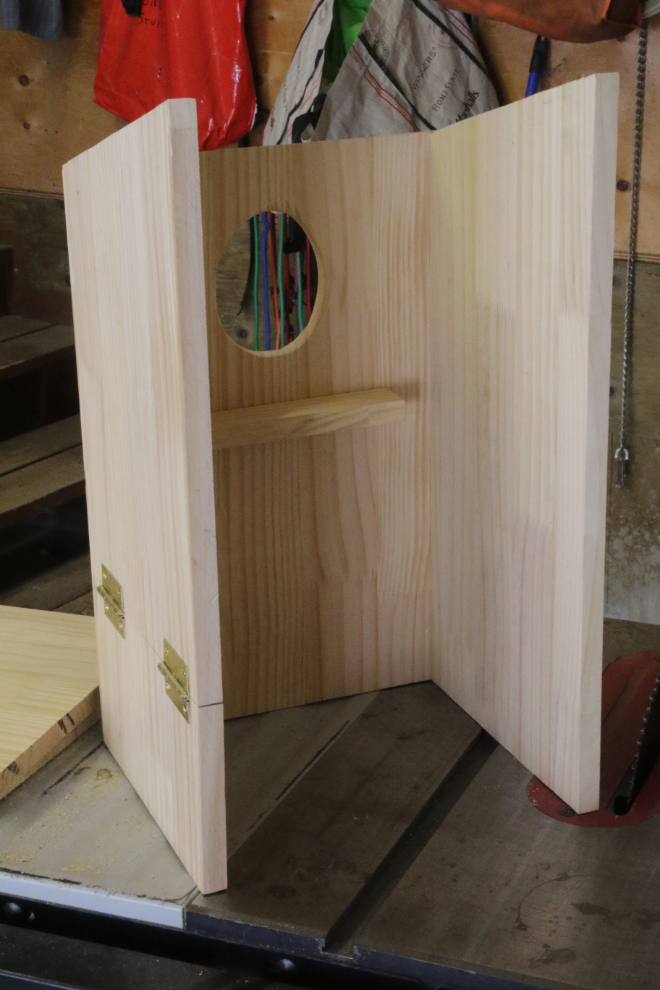 Building a boreal owl nesting box.