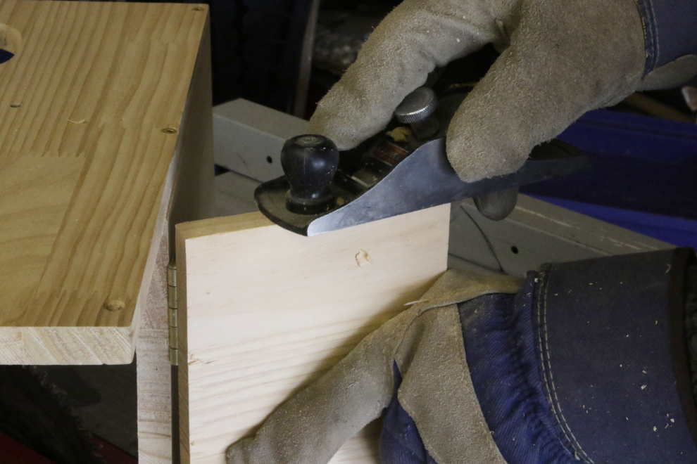 Building a boreal owl nesting box.