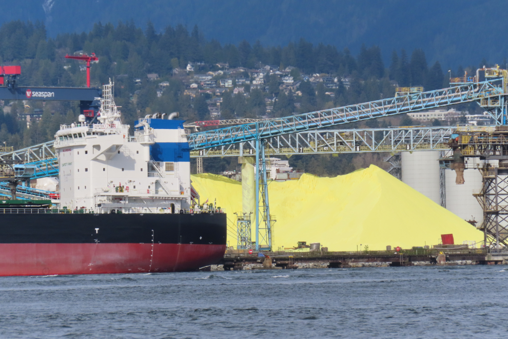 Piles of sulphur wait to be loaded onto ships at North Vancouver. 