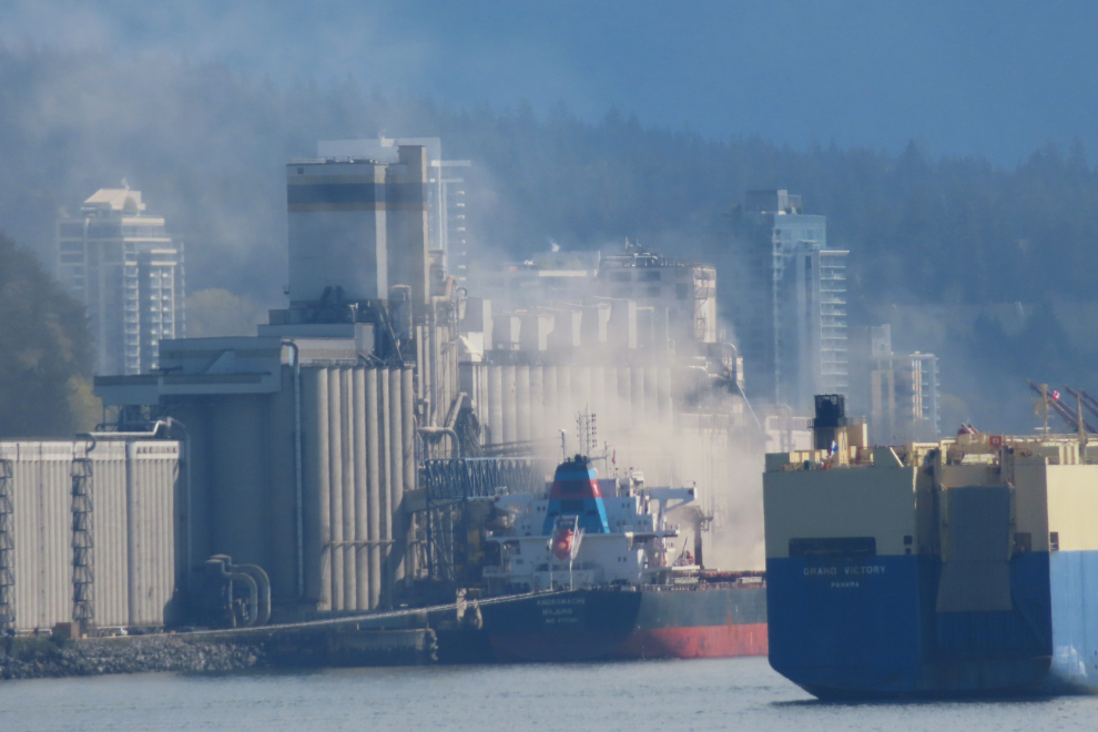 Lots of dust loading a ship at North Vancouver.
