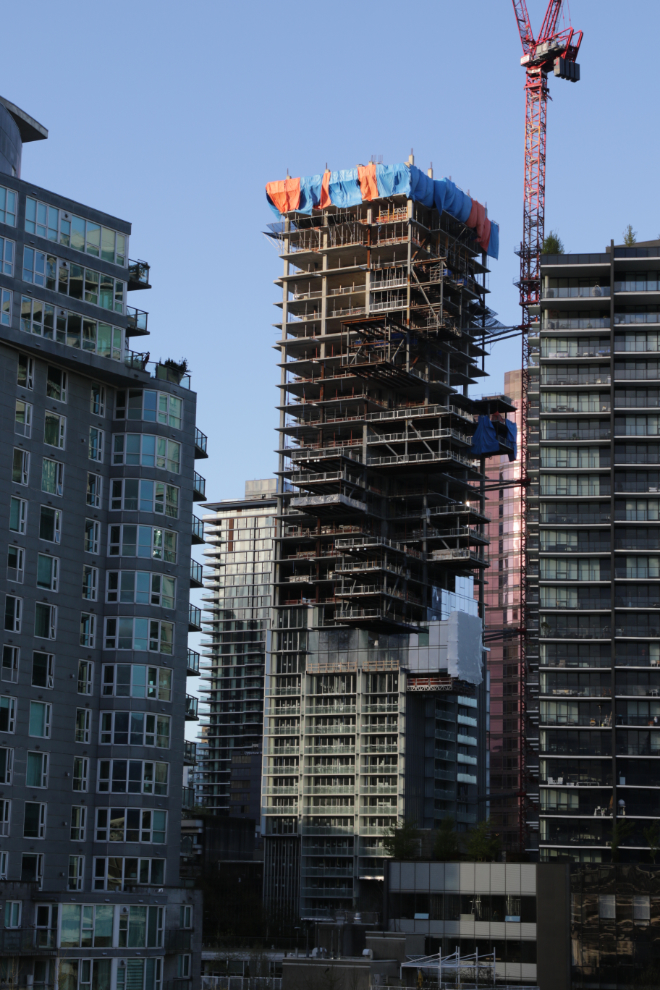 An intriguing new tower under construction in downtown Vancouver, with floors jutting out all over.