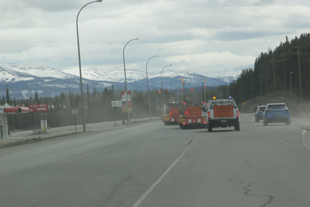 Street sweepers on the Alaska Highway at Whitehorse.