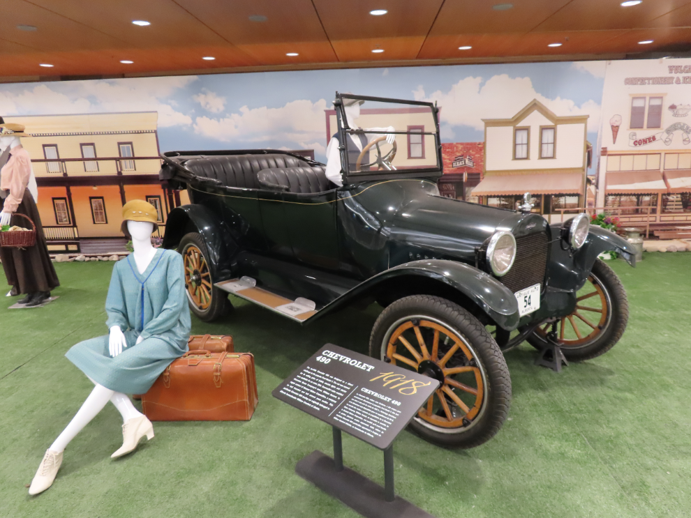 Heritage Park has a large promotional display at the Calgary Airport, with two vehicles.